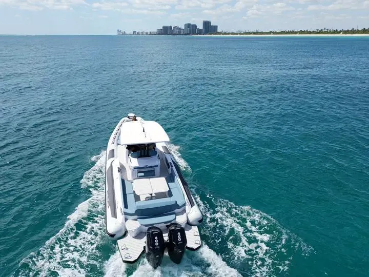 Slide: The Image of 2025 Ranieri CAYMAN 38.0 EXECUTIVE luxury boat cruising on open water. - 3