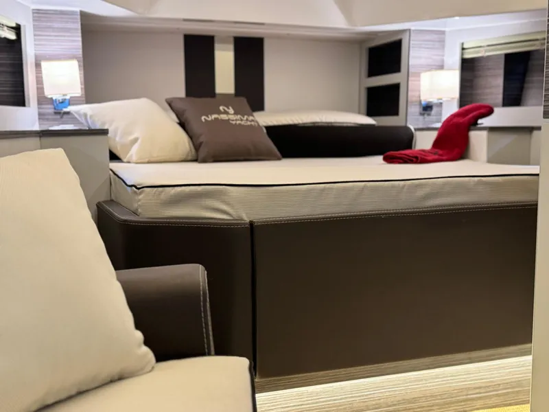 Slide: The Image of Luxurious bedroom interior of Nassima Yacht N40, 2025 model, featuring modern design and cozy furnishings. - 11