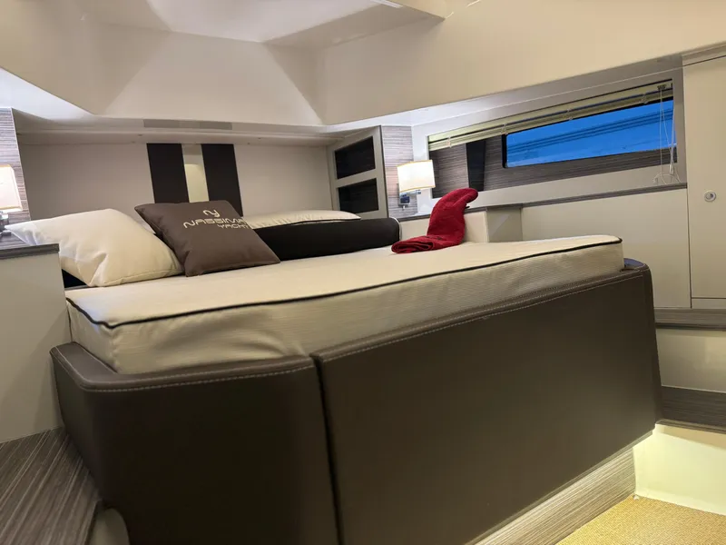 Slide: The Image of Luxurious bedroom interior of 2025 Nassima Yacht N40 with modern design and cozy bedding. - 12
