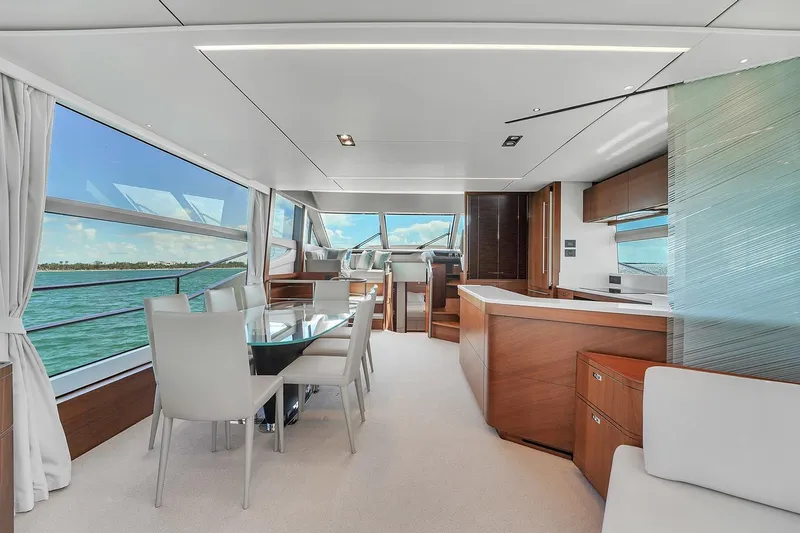 Slide: The Image of Luxurious interior of 2021 Princess Y78 yacht with modern dining area and panoramic windows. - 19