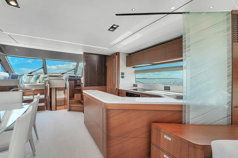 Slide: The Image of Luxurious interior of 2021 Princess Y78 yacht with modern kitchen and dining area. - 24