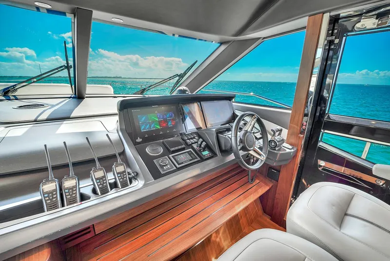 Slide: The Image of Luxury yacht Princess Y78 2021 helm station with advanced navigation systems and ocean view. - 34