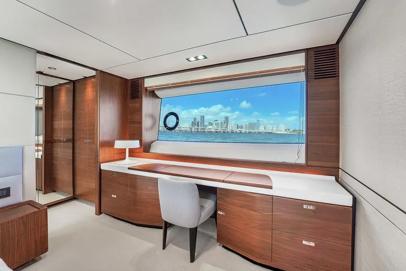 Slide: The Image of Luxurious interior of 2021 Princess Y78 yacht with city skyline view through window. - 46