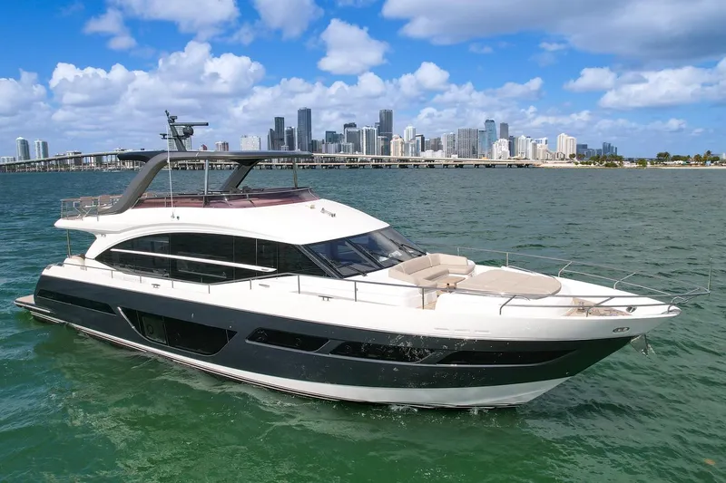 Slide: The Image of Luxury Princess Y78 yacht cruising near city skyline, 2021 model. - 5