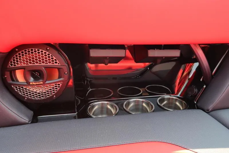 Slide: The Image of Interior of 2025 MasterCraft NXT20 boat with speaker and cup holders. - 14