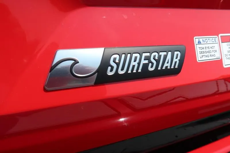 Slide: The Image of Red 2025 MasterCraft NXT20 boat with SurfStar logo and safety notice. - 7