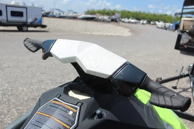 Slide: The Image of 2017 Sea-Doo Waverunner SPARK™ handlebars in a sunny outdoor setting. - 8