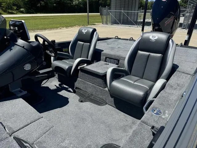 Slide: The Image of 2025 Phoenix Bass Boats 721 ZXL interior with dual seats and steering console. - 15