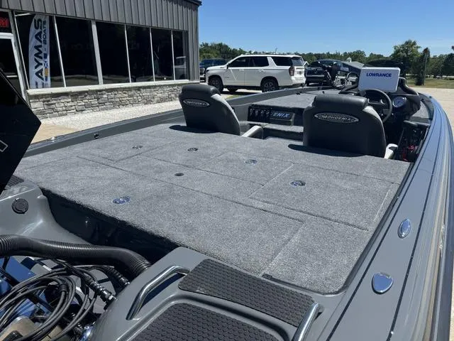 Slide: The Image of 2025 Phoenix Bass Boats 721 ZXL interior with spacious deck and dual seats. - 5