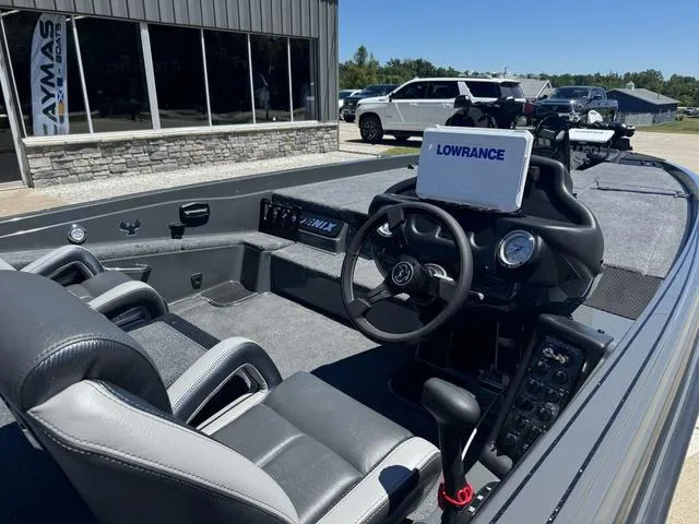 Slide: The Image of 2025 Phoenix Bass Boats 721 ZXL interior with Lowrance electronics and dual seating. - 6