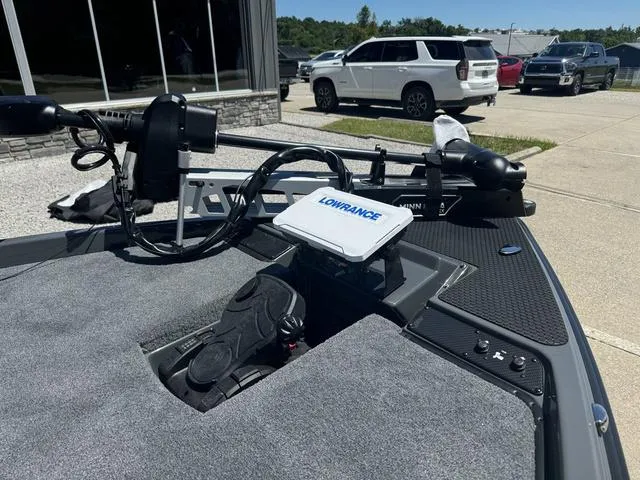 Slide: The Image of 2025 Phoenix Bass Boats 721 ZXL with Lowrance fishfinder and trolling motor. - 9