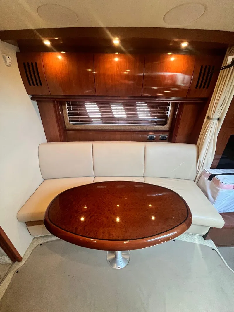 Slide: The Image of Interior seating area of a 2006 Sea Ray 38 Sundancer yacht. - 24