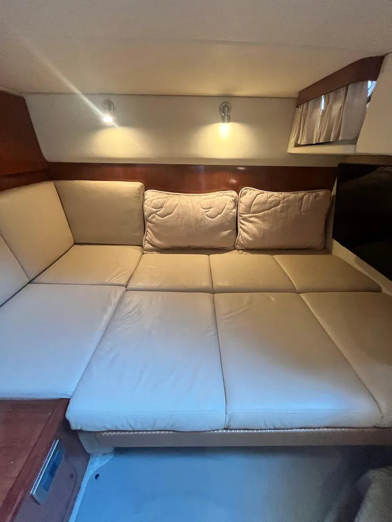 Slide: The Image of Luxurious interior seating of 2006 Sea Ray 38 Sundancer yacht. - 27