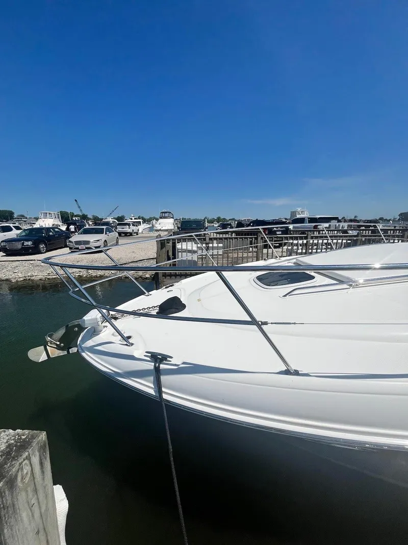 Slide: The Image of 2006 Sea Ray 38 Sundancer docked at a marina on a sunny day. - 5