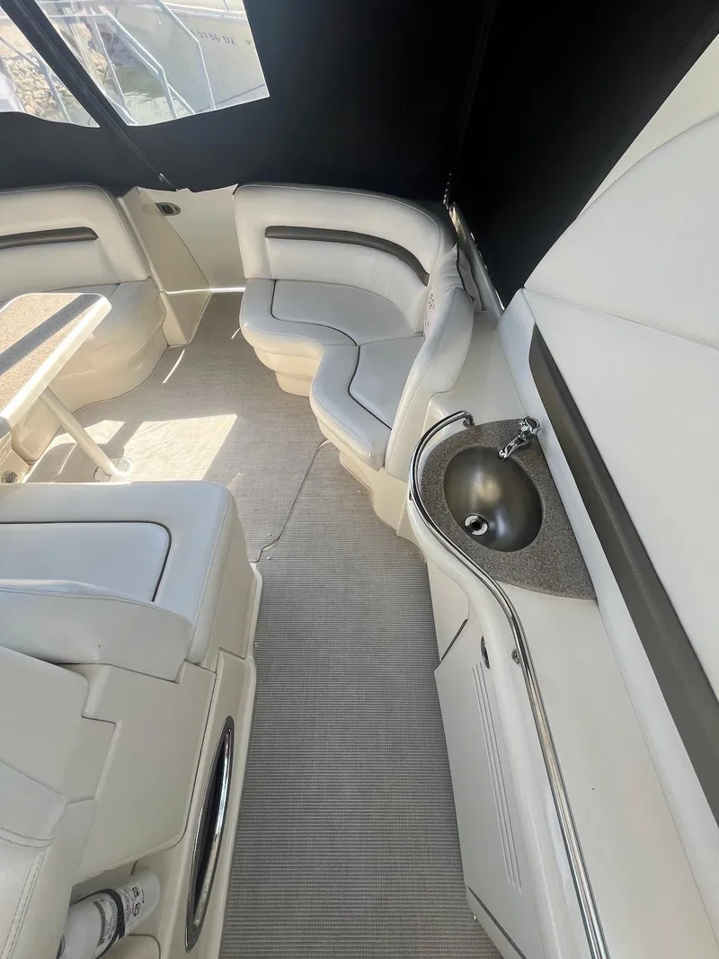 Slide: The Image of Interior of 2006 Sea Ray 38 Sundancer with seating and sink. - 8