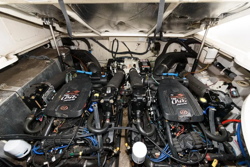 Slide: The Image of Engine room of a 2006 Sea Ray 320 Sundancer with twin MerCruiser engines. - 18