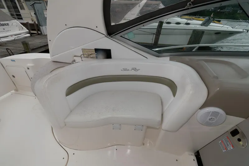 Slide: The Image of 2006 Sea Ray 320 Sundancer boat interior seating area. - 9