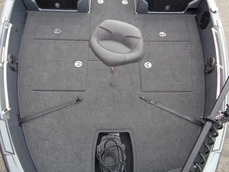 Slide: The Image of 2024 Nitro ZV21 Pro boat deck with a central seat and storage compartments. - 10