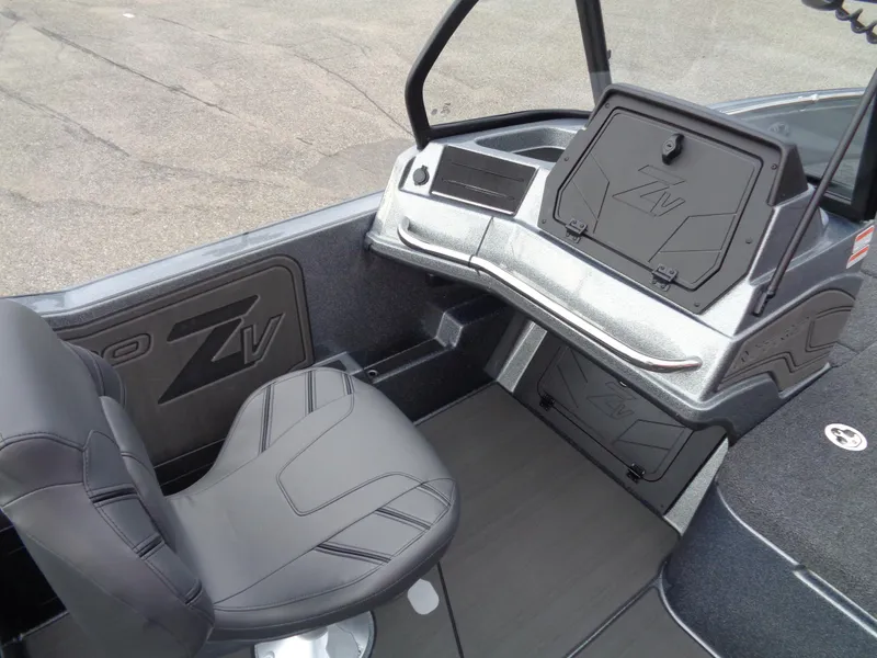 Slide: The Image of 2024 Nitro ZV21 Pro boat interior with driver's seat and dashboard. - 12