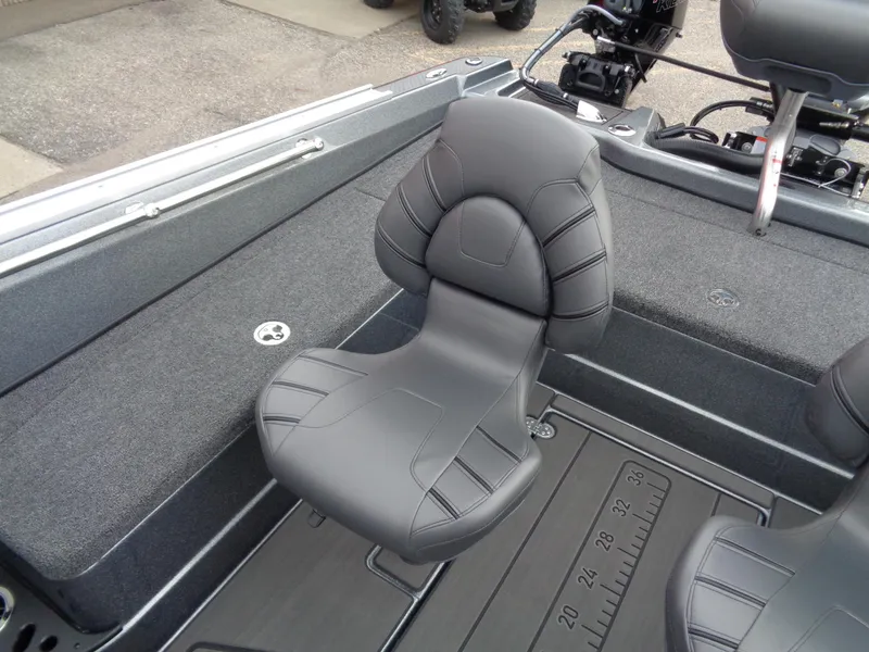 Slide: The Image of 2024 Nitro ZV21 Pro boat interior with cushioned seating. - 13