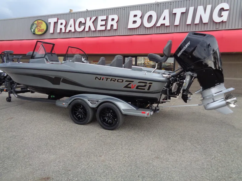 Slide: The Image of 2024 Nitro ZV21 Pro boat displayed at Tracker Boating store. - 2