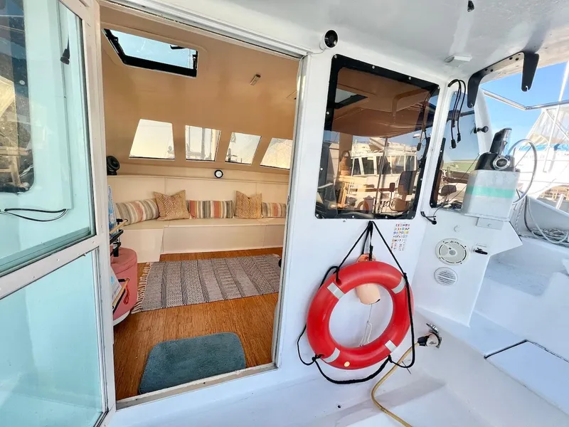 Slide: The Image of 2007 Farrier F-41 boat interior with seating area and life preserver. - 11
