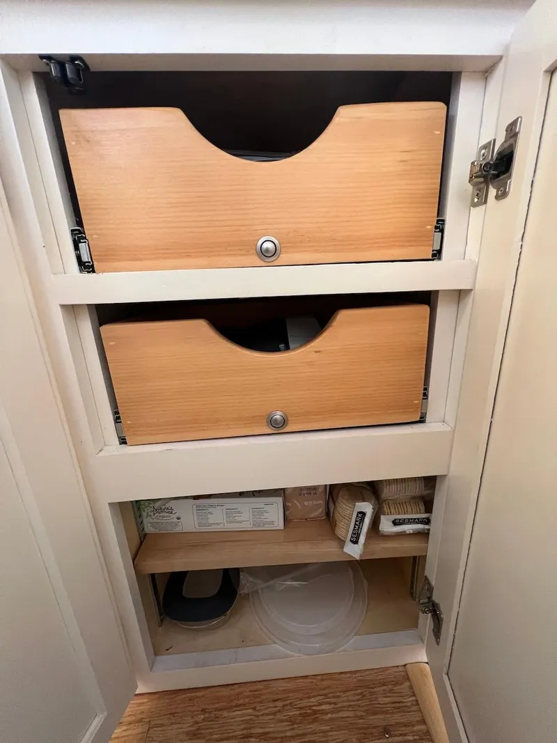 Slide: The Image of Wooden cabinet with two drawers and storage space, Farrier F-41 model, 2007. - 26