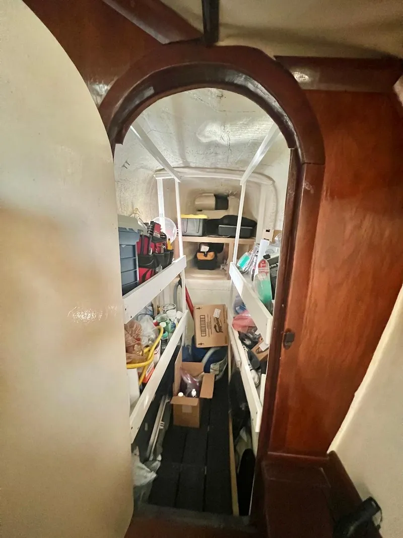 Slide: The Image of Interior of 2007 Farrier F-41 boat with storage shelves and supplies. - 35