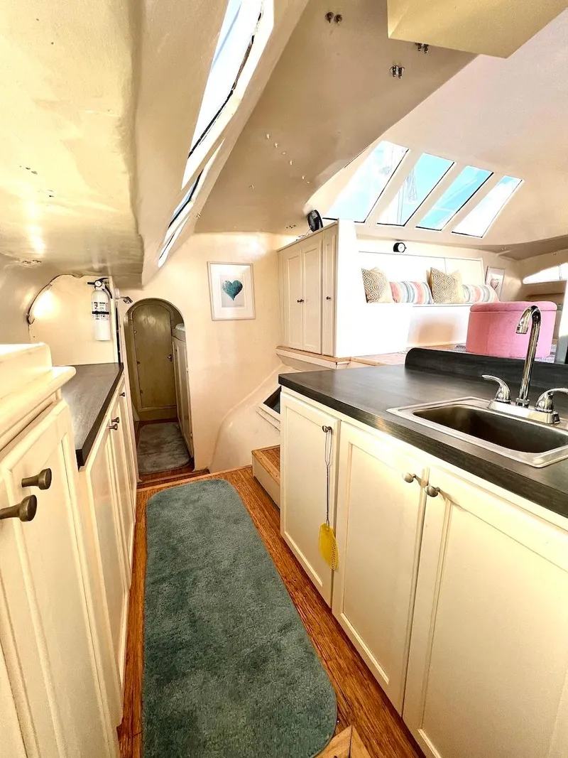 Slide: The Image of 2007 Farrier F-41 yacht interior with modern kitchen and skylights. - 44