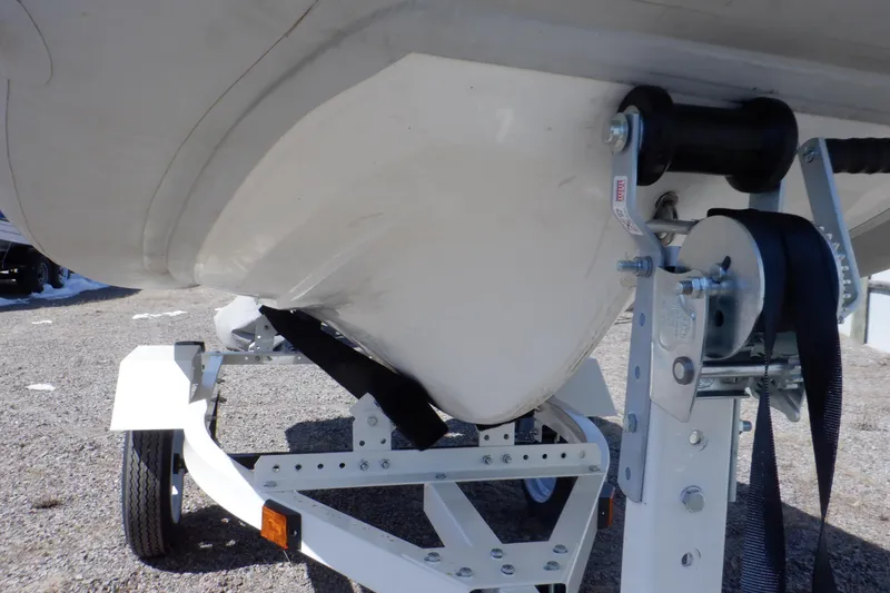 Slide: The Image of 2015 Walker Bay 325 STX Odyssey boat on trailer, close-up of hull and winch. - 10