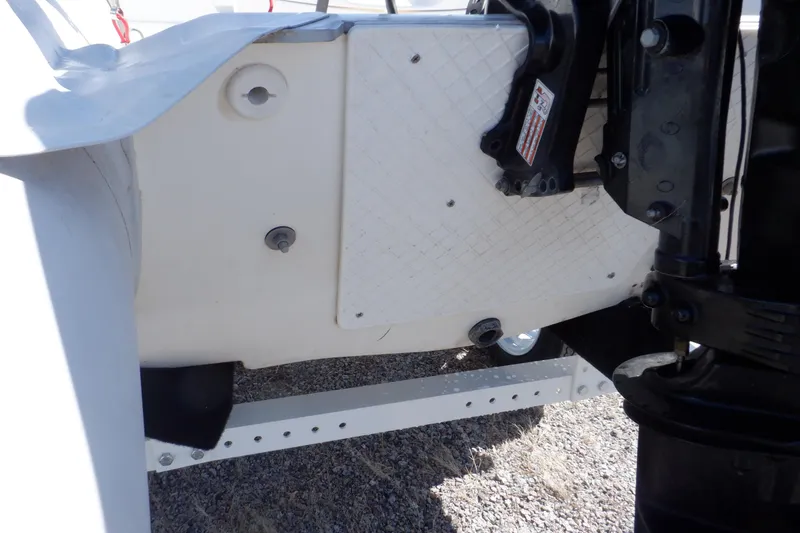 Slide: The Image of 2015 Walker Bay 325 STX Odyssey boat detail, showing engine mount and hull structure. - 35