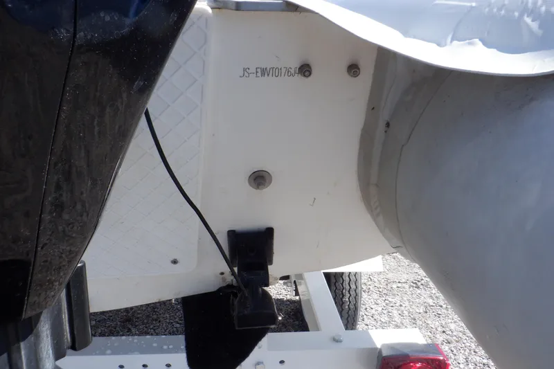 Slide: The Image of 2015 Walker Bay 325 STX Odyssey boat transom with serial number visible. - 36