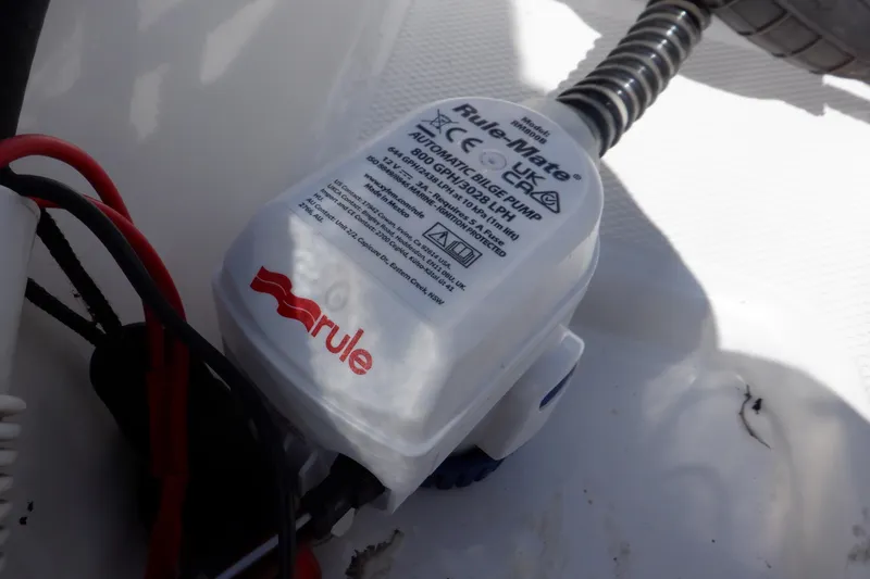 Slide: The Image of Automatic bilge pump in a 2015 Walker Bay 325 STX Odyssey boat. - 41
