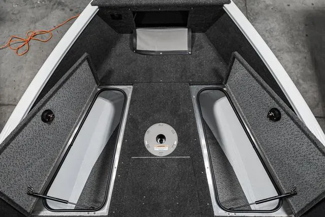 Slide: The Image of 2024 Lund 1675 Adventure Sport boat interior storage compartments. - 11