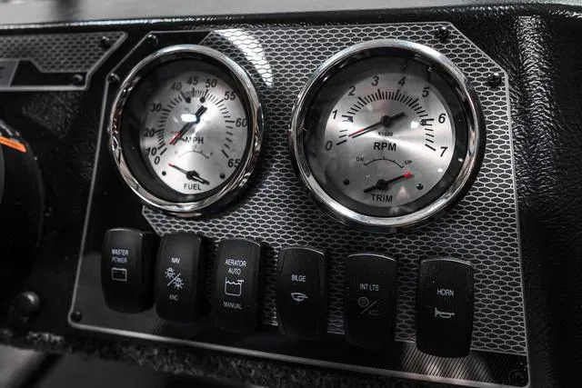 Slide: The Image of Dashboard of 2024 Lund 1675 Adventure Sport with fuel and RPM gauges. - 7