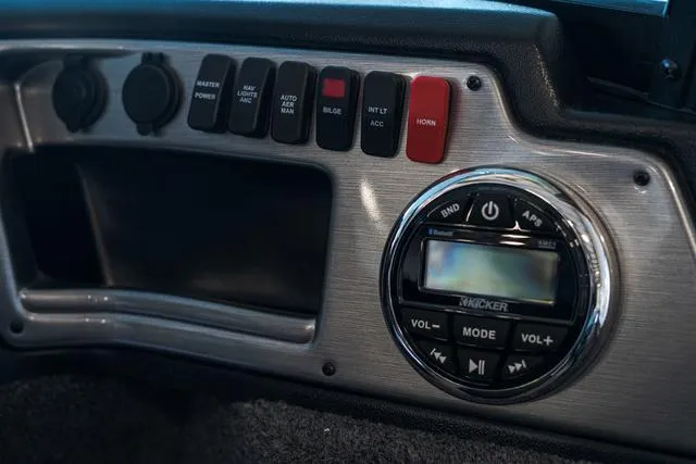 Slide: The Image of 2024 Lund 1775 Impact XS Sport boat interior storage compartment. - 10