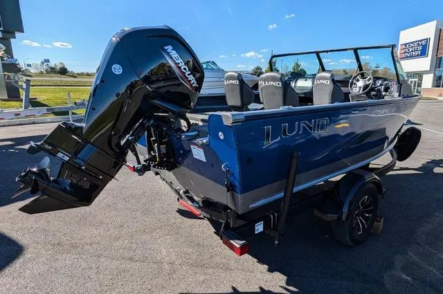 Slide: The Image of Wireless phone charger in 2024 Lund 1775 Impact XS Sport boat. - 6