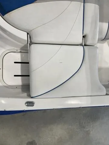 Slide: The Image of 2010 Bryant 210 BR boat seat storage compartment. - 12