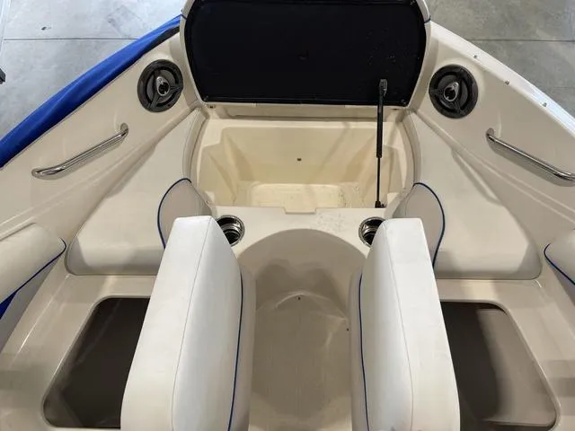 Slide: The Image of Close-up of the stern of a 2010 Bryant 210 BR boat. - 16