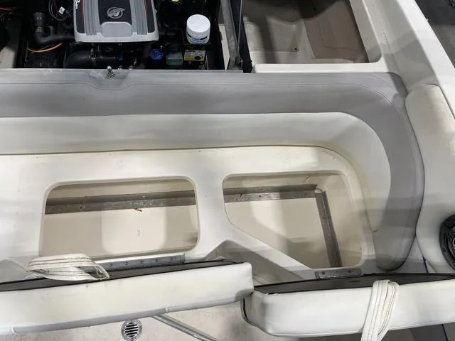 Slide: The Image of 2010 Bryant 210 BR boat engine compartment with open hatch. - 24