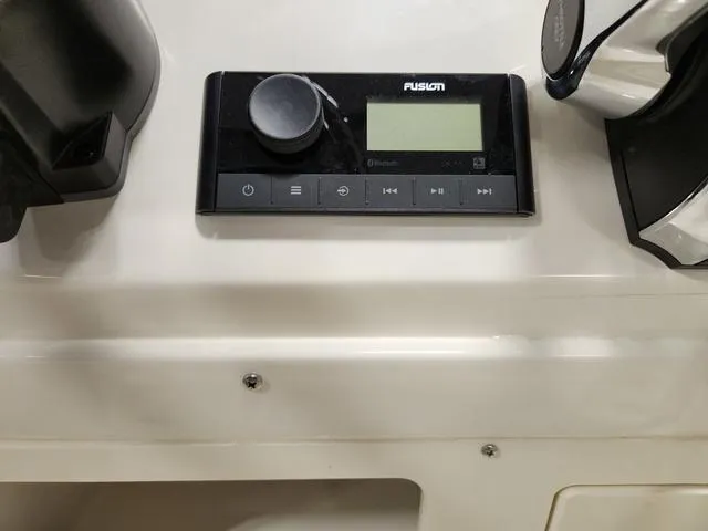 Slide: The Image of Fusion Bluetooth stereo system on 2023 Stingray 173CC boat dashboard. - 12