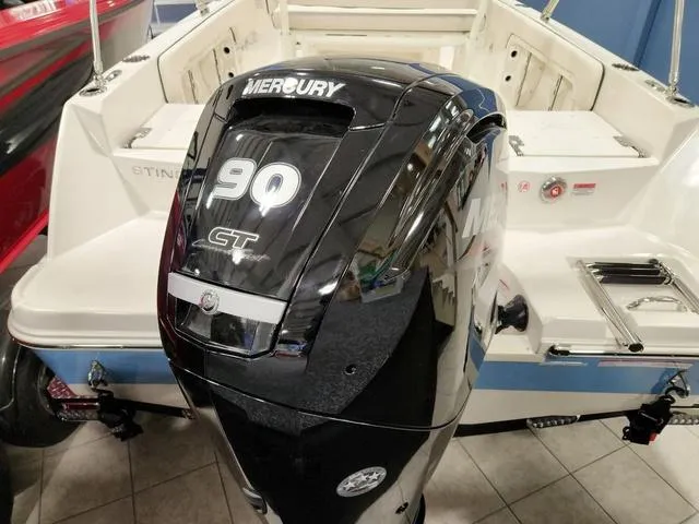 Slide: The Image of 2023 Stingray 173CC boat with Mercury 90 CT outboard motor. - 28