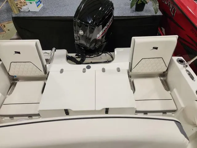 Slide: The Image of 2023 Stingray 173CC boat interior with Mercury outboard motor. - 8