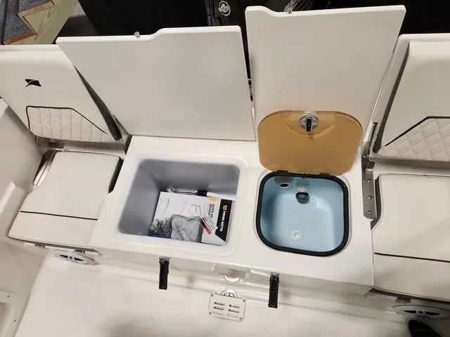 Slide: The Image of 2023 Stingray 173CC boat storage compartments and livewell. - 9