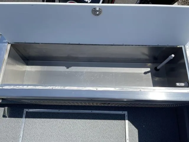Slide: The Image of Open storage compartment in 2024 Thunder Jet Alexis OS 22' boat. - 13