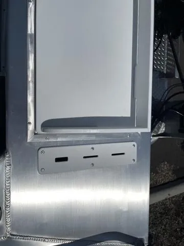 Slide: The Image of 2024 Thunder Jet Alexis OS 22' boat interior detail with aluminum finish. - 15