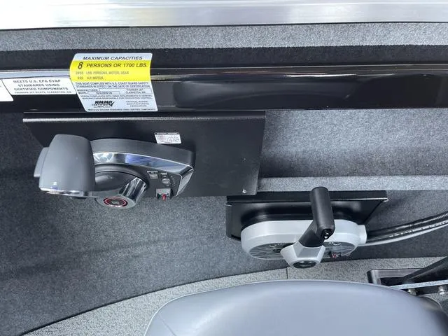 Slide: The Image of Control panel of 2024 Thunder Jet Alexis OS 22' boat with capacity label. - 34