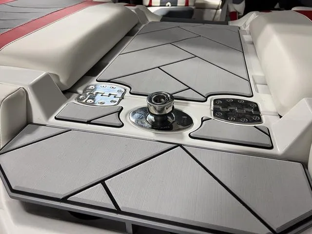 Slide: The Image of 2024 Malibu 23 LSV boat interior storage compartment. - 16