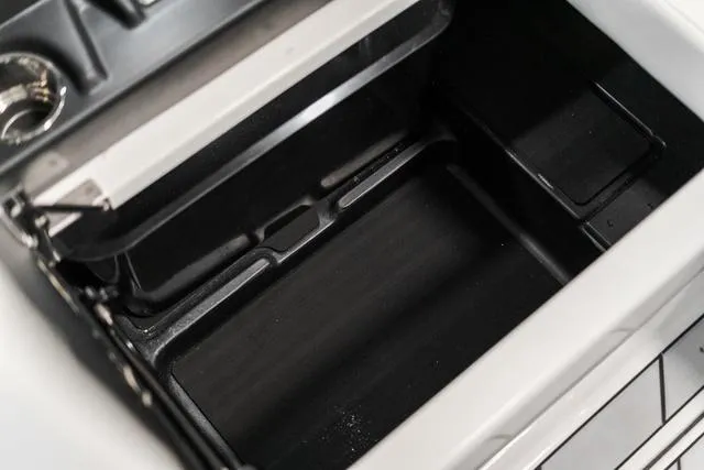 Slide: The Image of 2024 Malibu 23 LSV boat interior storage compartment. - 26