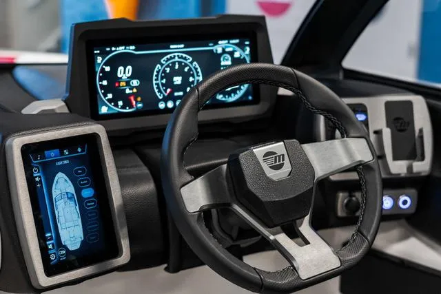 Slide: The Image of 2024 Malibu 23 LSV digital dashboard display showing RPM and speed. - 28